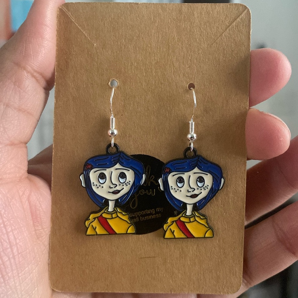 Coraline charm earrings.